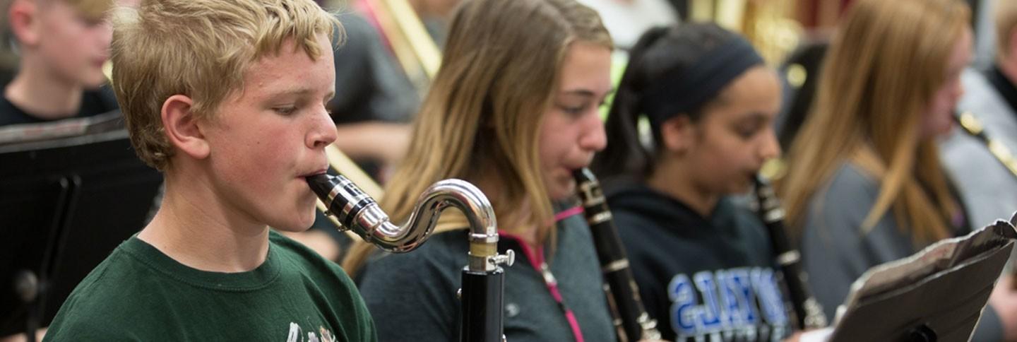 students playing in band