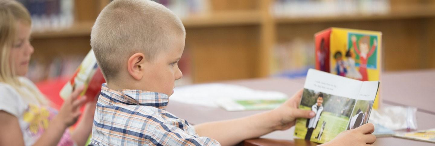 Student reading a book